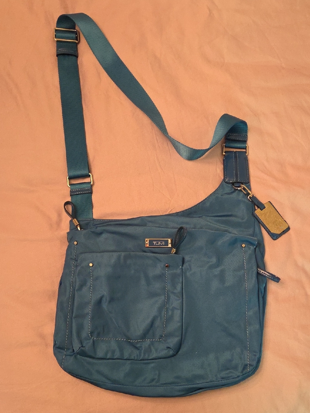 Tumi Teal Adjustable Crossbody Bag with Gold Accents
